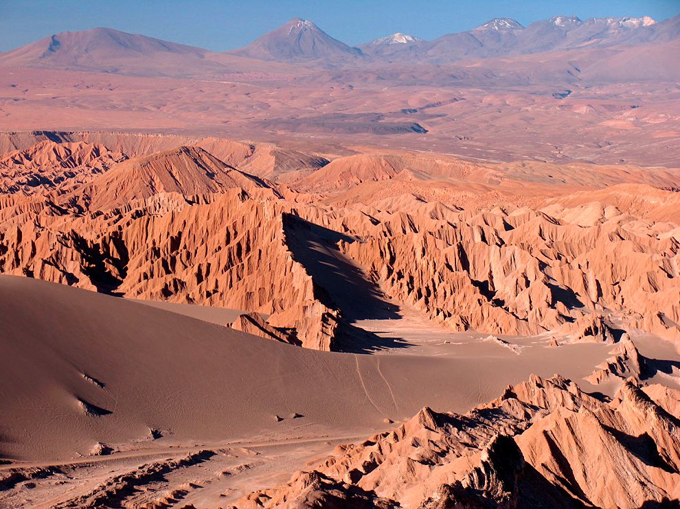 The Atacama desert is extremely arid. These conditions favor perchlorate accumulation. The isotopic makeup of the perchlorate is likely unique to the area.